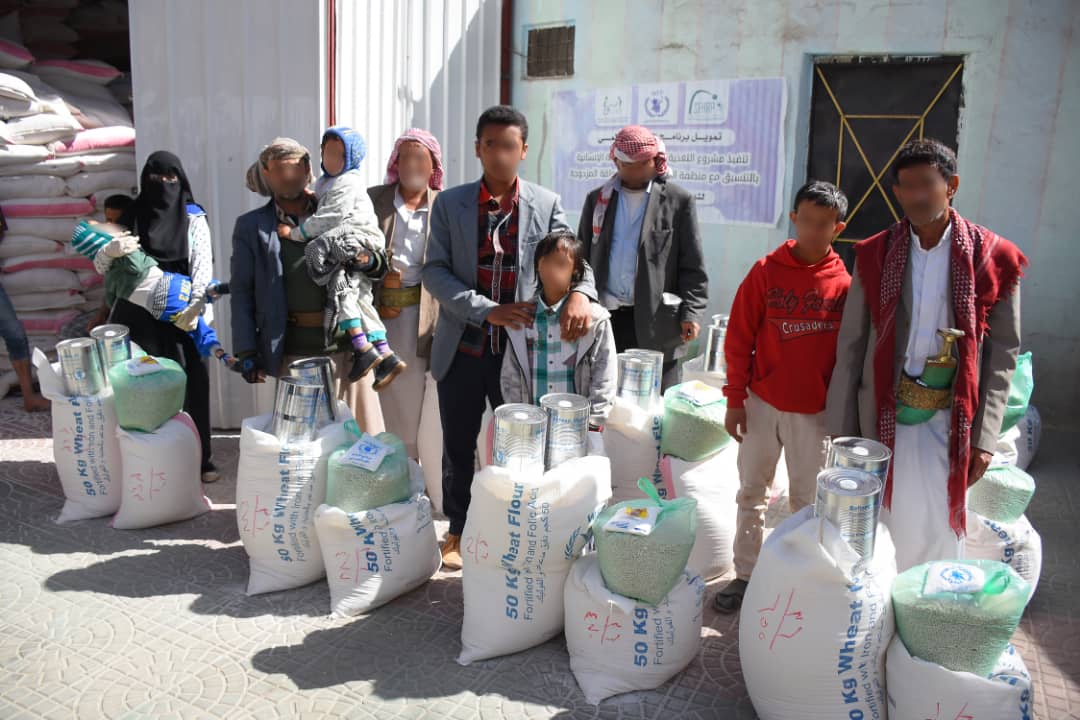 بالصور.. للعام الثالث على التوالي منظمة الأشخاص ذوي الإعاقة المزدوجة توزع السلة الغذائية الشهرية للمعاقين
